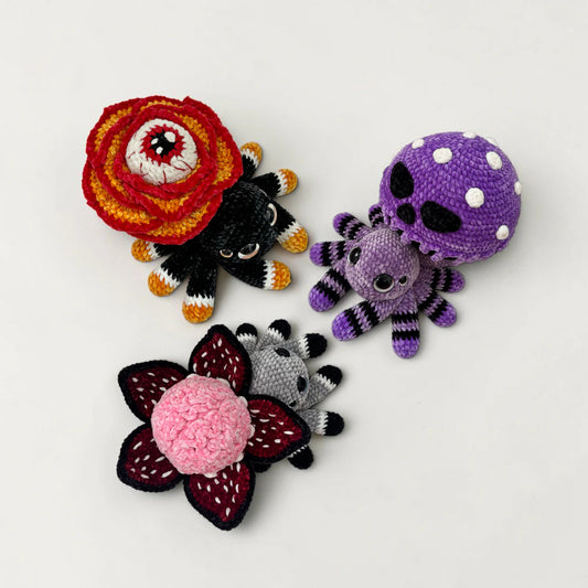 Spooky Flower Spider Crochet Pattern Bundle featuring Rose-Eyed Spider, Brain Flower Spider, and Poisoned Mushroom Spider amigurumi plushies