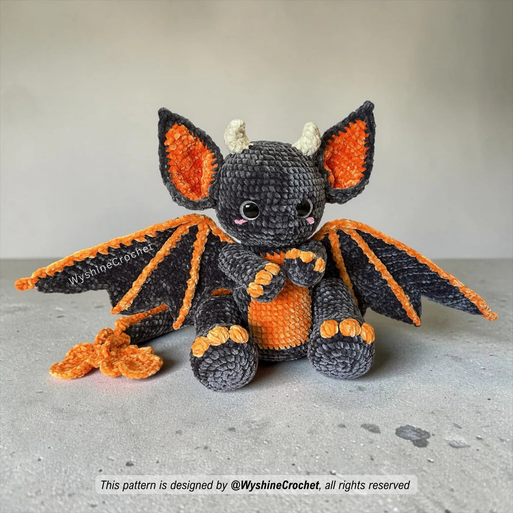 Bat Dragon Crochet Pattern PDF showing a fantasy amigurumi hybrid with dragon claws, bat wings, horns, spikes, and long tail
