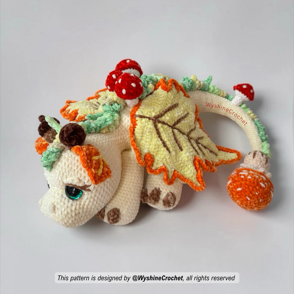 Easy to follow dragon amigurumi pattern PDF with step by step photo instructions for wings, spikes, mushrooms, and details
