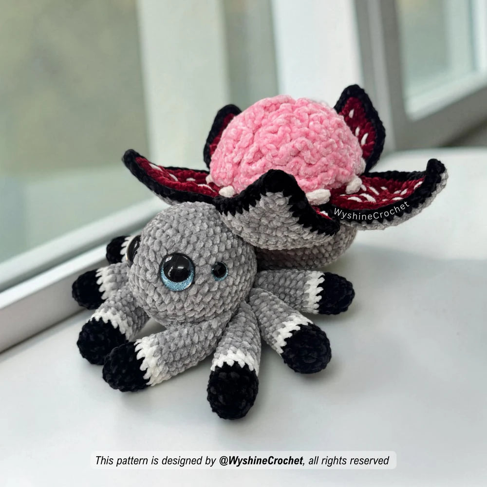  Materials for Brain Flower Spider Crochet Pattern including chenille yarn, 16 mm and 30 mm safety eyes, 5 mm hook, and fiberfill