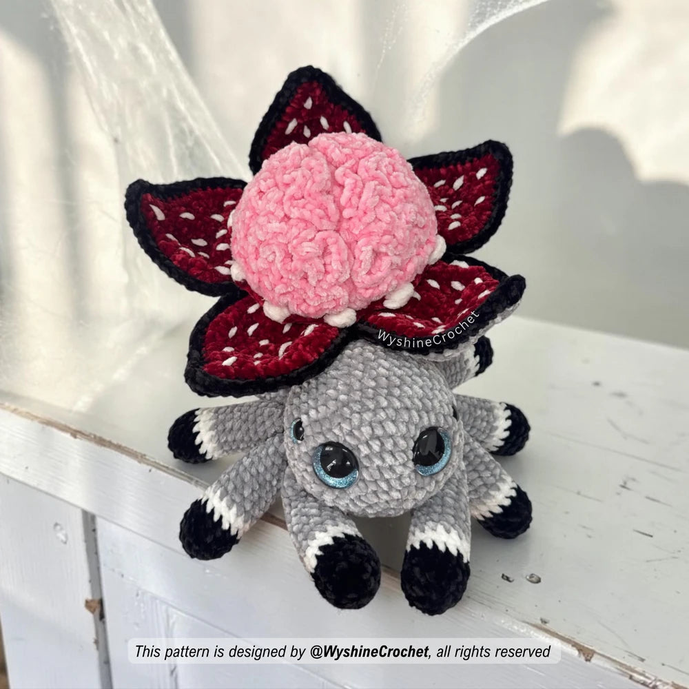  Easy to follow Halloween spider amigurumi PDF with step by step photo instructions for brain texture, flower petals, teeth, and legs