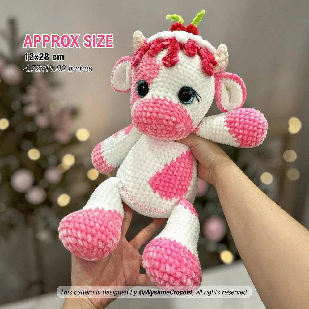 Candy Cow amigurumi pattern size reference showing finished plushie approx 12 cm by 28 cm