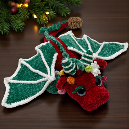 Christmas Dragon Crochet Pattern featuring red and green amigurumi dragon with festive tree-inspired details
