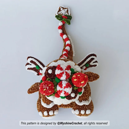 Handmade Christmas amigurumi dragon pattern featuring a chubby gingerbread character for holiday decor, seasonal crochet gifts, and festive displays