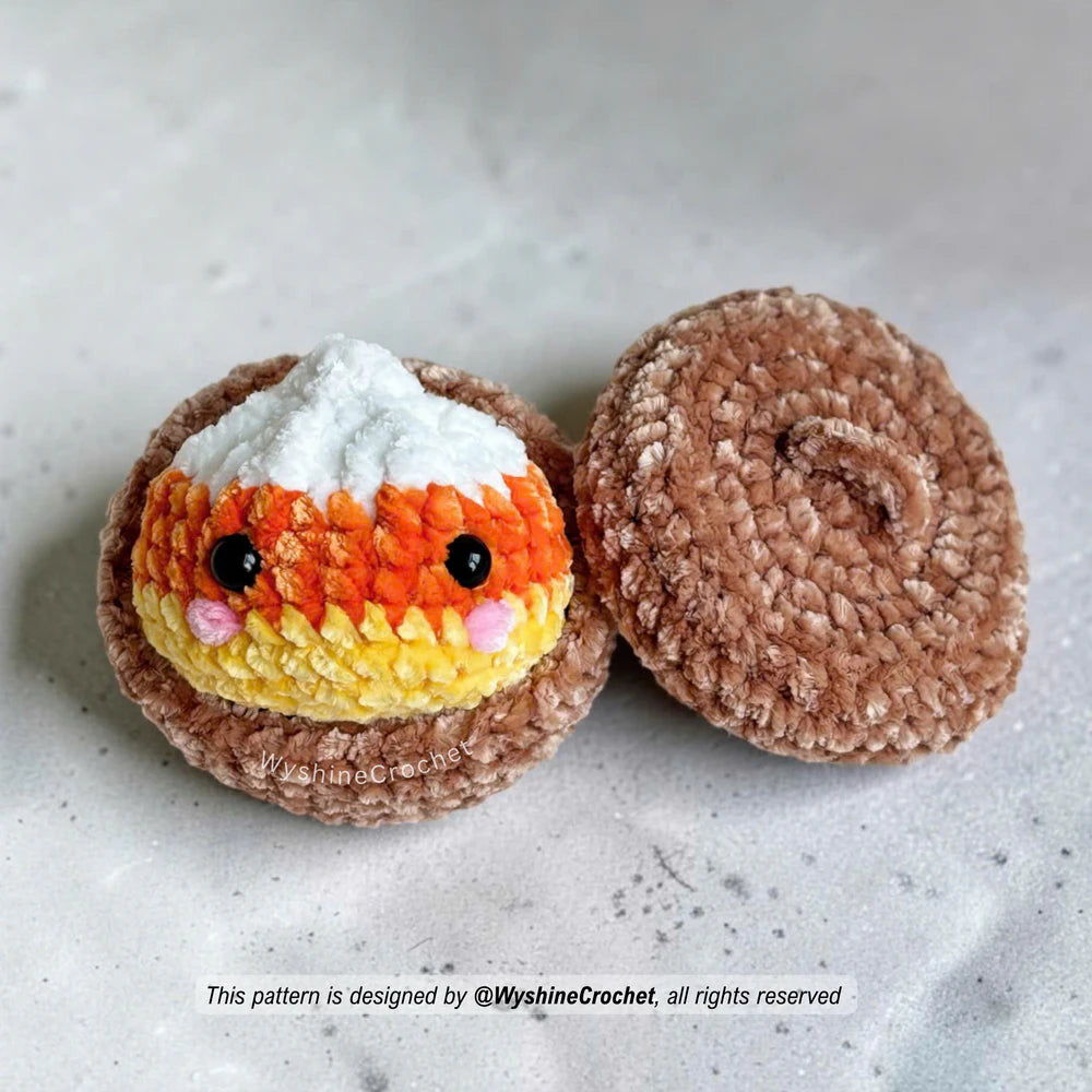 Candy Corn Dumpling crochet pattern with white, orange, and yellow Halloween color changes