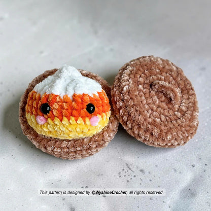 Candy Corn Dumpling crochet pattern with white, orange, and yellow Halloween color changes