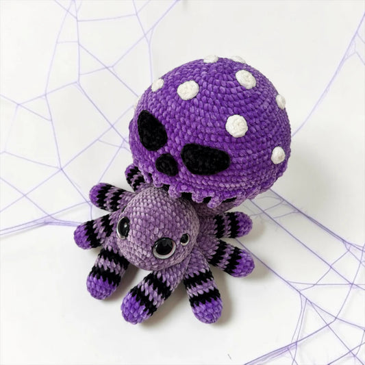 Poisoned Mushroom Spider Crochet Pattern finished Halloween amigurumi plushie with purple mushroom cap, skull face details, and eight spider legs
