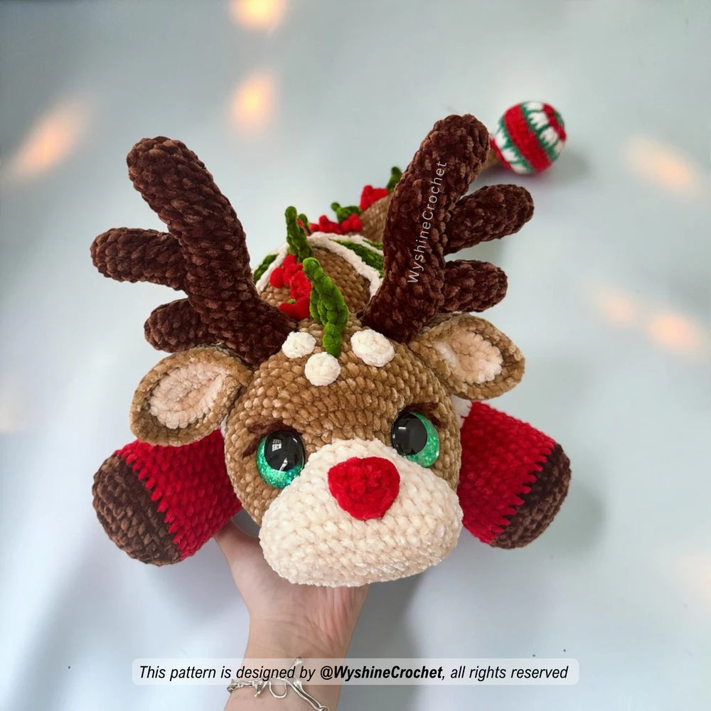 Reindeer Dragon crochet pattern PDF showing a large holiday dragon plushie with red and green Christmas decorations
