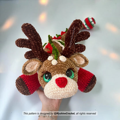Reindeer Dragon crochet pattern PDF showing a large holiday dragon plushie with red and green Christmas decorations
