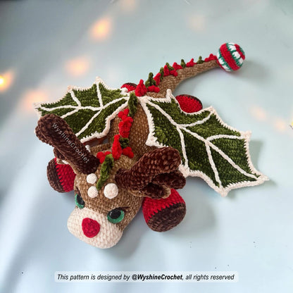 Dragon crochet pattern PDF for making a magical reindeer-dragon plushie with long tail and Christmas ball decoration
