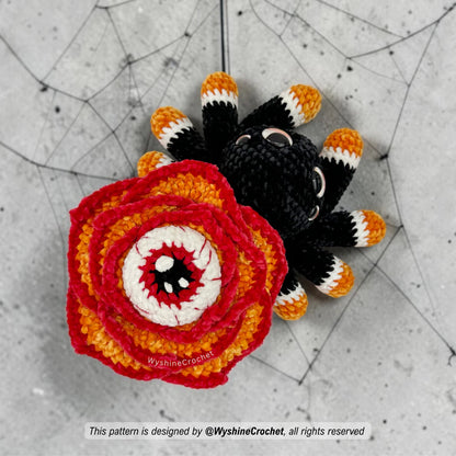  Materials for Rose-Eyed Spider Crochet Pattern including chenille yarn, 16 mm and 30 mm safety eyes, 5 mm hook, and fiberfill
