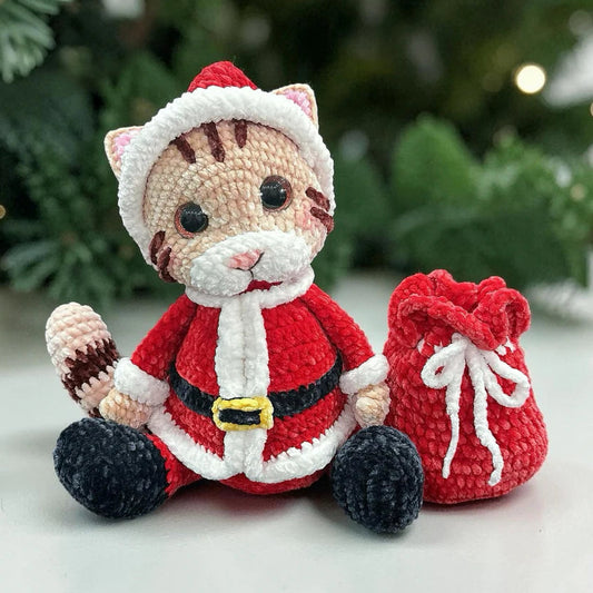 Santa Cat Crochet Pattern featuring a Christmas cat amigurumi plushie wearing a red Santa outfit with fluffy white trim