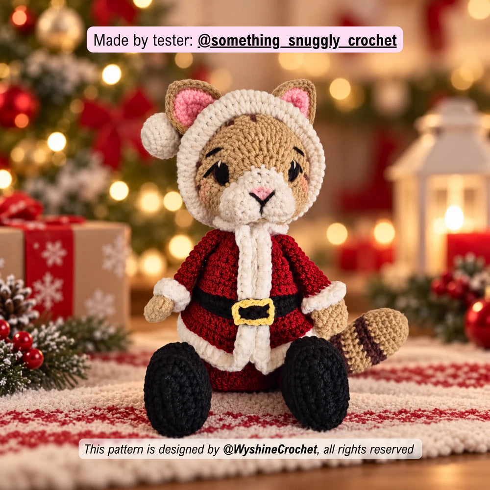Tester-made Santa Cat crochet plushie showing a handmade Christmas cat amigurumi variation with festive holiday charm