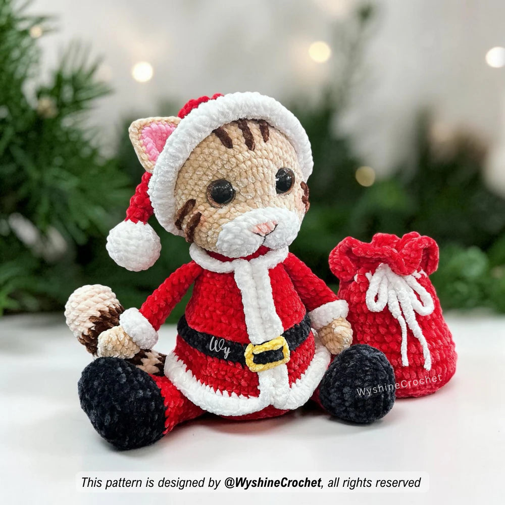 Santa Cat - a cuddly messenger of Christmas kindness, bringing playful warmth and the joy of giving to handmade holiday decor